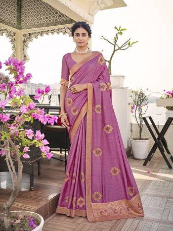 Garb This Party Wear Saree Are Fine Saree Paired With Matching Blouse.This Heavy Designer Work And Dianond Work Saree Is Dola Silk And Blouse Fabric. Which Gives A Rich LookTo Your Personality. Buy This Pretty Saree Now.