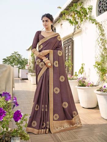 Garb This Party Wear Saree Are Fine Saree Paired With Matching Blouse.This Heavy Designer Work And Dianond Work Saree Is Dola Silk And Blouse Fabric. Which Gives A Rich LookTo Your Personality. Buy This Pretty Saree Now.