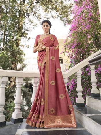 Garb This Party Wear Saree Are Fine Saree Paired With Matching Blouse.This Heavy Designer Work And Dianond Work Saree Is Dola Silk And Blouse Fabric. Which Gives A Rich LookTo Your Personality. Buy This Pretty Saree Now.