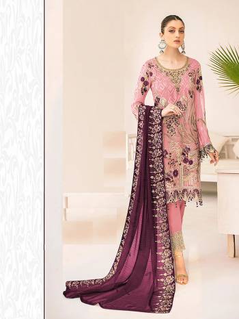 Garb This Designer Long Length Pakistani Suit In Lovely Light Color.?Its Pretty Heavy Designer Embroidred Work Top Is Faux Grorgette Based Paired With Santoon Bottom And Naznin Fabricated Dupatta Which Gives An Attractive To The Suit.