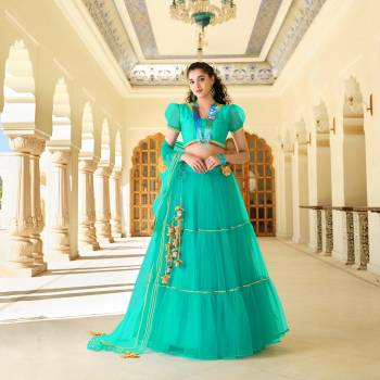 Attrective Look This Heavy Designer Lehenga Choli In All Over Color. This Stylist Gota Patti Patern Work Lehenga Choli Is Butterfly Net Based Paired With Butterfly Net Fabricated Dupatta, It Is Beautified With Lovely Attractive Look.