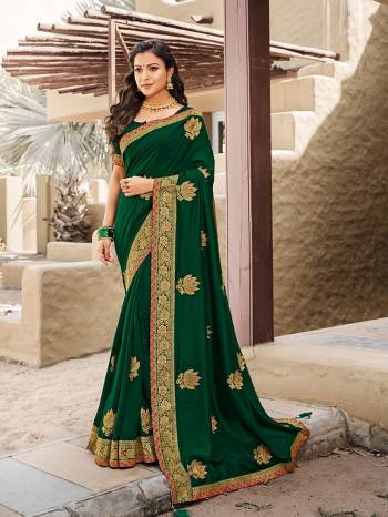 Look Attractive Wearing This Fine Colored Saree Paired With Blouse.  This Heavy Designer Saree Is Vichitra Silk Based Which Gives A Rich Look To Your Personality. Buy This Pretty Saree Now.