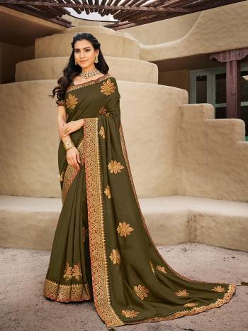 Look Attractive Wearing This Fine Colored Saree Paired With Blouse.  This Heavy Designer Saree Is Vichitra Silk Based Which Gives A Rich Look To Your Personality. Buy This Pretty Saree Now.