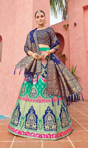 Attrective Look This Heavy Designer Lehenga Choli In Fine Color. This Stylist Designer Wevon Work Lehenga Choli And Dupatta Is Banarasi Silk Based Fabric. It Is Beautified With Lovely Attractive Look.