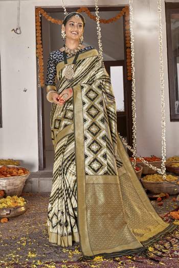 Garb This Traditional Partywear Saree Are Fine Saree Paired With Blouse.  This Designer Wevon Designer Saree And Blouse Is Banarasi Silk Based Fabric. Which Gives A Rich Look To Your Personality. Buy This Pretty Saree Now.