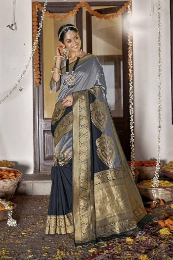 Garb This Traditional Partywear Saree Are Fine Saree Paired With Blouse.  This Designer Wevon Designer Saree And Blouse Is Banarasi Silk Based Fabric. Which Gives A Rich Look To Your Personality. Buy This Pretty Saree Now.