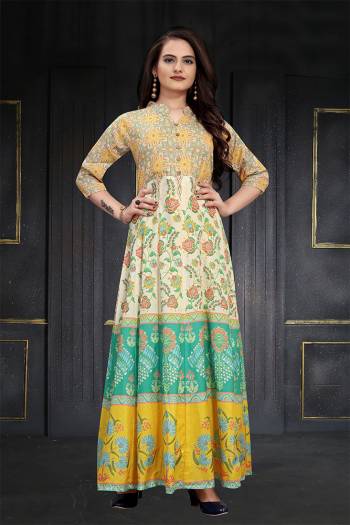 This Designer Readymade Long Gown In Fine Color. This  Pretty Gown Is Fabricated On Maslin Beautified With Designer Printed. Its Fabric Is Soft Towards Skin And Easy To Carry All Day Long. 