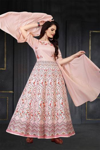 This Designer Readymade Long Gown In Fine Color. This  Pretty Gown Is Fabricated On Maslin Beautified With Designer Printed. Its Fabric Is Soft Towards Skin And Easy To Carry All Day Long. 