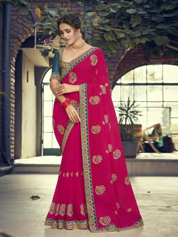 Look Attractive Wearing This Fine Colored Saree Paired With Contrasted Blouse.  This Heavy Designer Saree Is Georgette Based Which Gives A Rich Look To Your Personality. Buy This Pretty Saree Now.