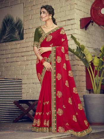 Look Attractive Wearing This Fine Colored Saree Paired With Contrasted Blouse.  This Heavy Designer Saree Is Georgette Based Which Gives A Rich Look To Your Personality. Buy This Pretty Saree Now.