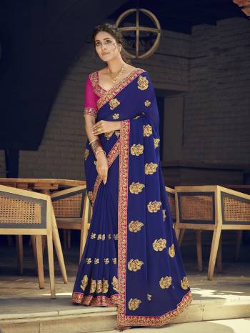 Look Attractive Wearing This Fine Colored Saree Paired With Contrasted Blouse.  This Heavy Designer Saree Is Georgette Based Which Gives A Rich Look To Your Personality. Buy This Pretty Saree Now.