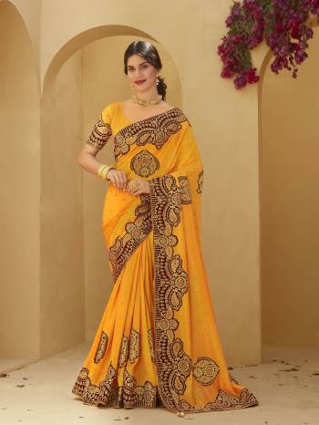 Adorn The Pretty Angelic Look Wearing This Heavy Designer Peach And Diamond Work Saree In Fine Color Paired With Blouse. This Saree Is Fabricated On Vichitra Silk Paired With  Blouse. Its Pretty Color Pallete Will Give An Attractive Look To Your Personality. 