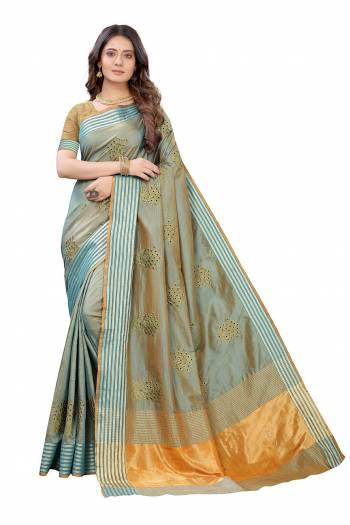 Celebrate This Festive Season In This Very Pretty Colored Designer Saree Paired With Blouse. This Saree and Blouse Soft Silk Based Beautified With Detailed Wevon With Embroidery Butta. 