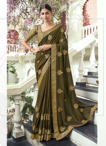 Grab This Pretty Elegant Looking Designer Saree In Fine Color Paired With Blouse. This Saree Are Vichitra Silk And Blouse Are Broket Based Beautified With Embroidery. Buy Now.