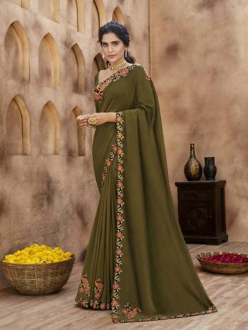 Adorn The Pretty Angelic Look Wearing This Heavy Designer Peach And Diamond WorkSaree In Fine Color Paired With Blouse. This Saree Is Fabricated On Vichitra Silk Paired With  Blouse. Its Pretty Color Pallete Will Give An Attractive Look To Your Personality. 