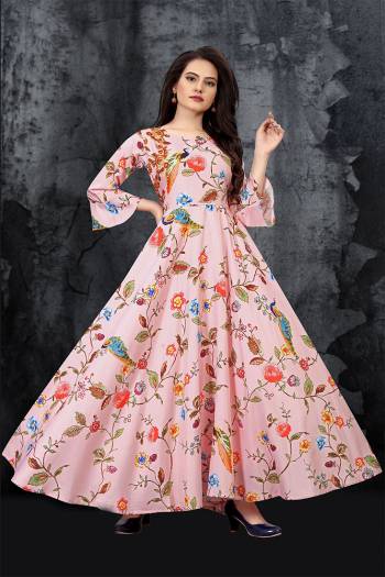 This Designer Readymade Long Gown In Fine Color. This  Pretty Gown Is Fabricated On Maslin Beautified With Designer Printed. Its Fabric Is Soft Towards Skin And Easy To Carry All Day Long. 