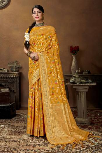 Garb This Traditional Partywear Saree Are Fine Saree Paired With Blouse.  This Heavy Wevon Designer Saree And Blouse Is Banarasi Silk Based Fabric. Which Gives A Rich Look To Your Personality. Buy This Pretty Saree Now.