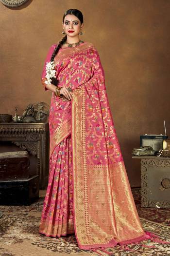 Garb This Traditional Partywear Saree Are Fine Saree Paired With Blouse.  This Heavy Wevon Designer Saree And Blouse Is Banarasi Silk Based Fabric. Which Gives A Rich Look To Your Personality. Buy This Pretty Saree Now.