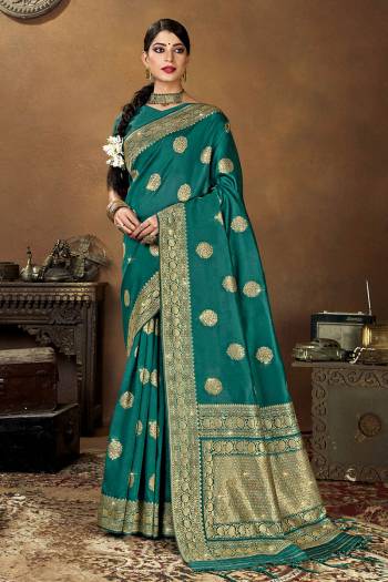 Look This Traditional Partywear Saree Are Fine Saree Paired With Blouse.  This Heavy Wevon Designer Saree And Blouse Is Banarasi Silk Based Fabric. Which Gives A Rich Look To Your Personality. Buy This Pretty Saree Now.