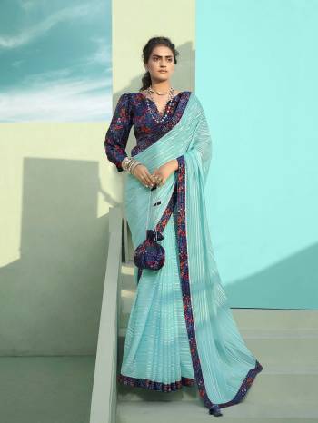 Grab This Pretty Elegant Looking Designer Saree In Fine Light Color Paired With Multy Color Blouse. This Saree Are Chiffon And Blouse Are Art Silk Based Beautified With Printed Blouse And Borer And Parsh. Buy Now.