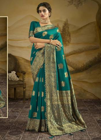 Adorn The Pretty Look Wearing This Heavy Designer Weaving Jacquard And Diamond Work Saree In Fine Color Paired With Blouse. This Saree Is Fabricated On Art Silk With  Blouse. Its Pretty Color Pallete Will Give An Attractive Look To Your Personality. 