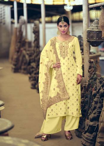 Attrective This Designer Long Length Suit In Lovely Light Color.?Its Pretty Heavy Wevon Jacquard Designer And Hand Work Top Is Silk Based Paired With Cotton Bottom And Silk Jacquard Fabricated Dupatta Which Gives An Attractive To The Suit.