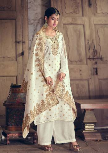 Attrective This Designer Long Length Suit In Lovely Light Color.?Its Pretty Heavy Wevon Jacquard Designer And Hand Work Top Is Silk Based Paired With Cotton Bottom And Silk Jacquard Fabricated Dupatta Which Gives An Attractive To The Suit.