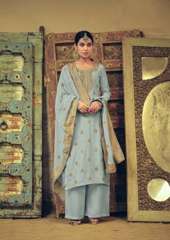 Attrective This Designer Long Length Suit In Lovely Light Color.?Its Pretty Heavy Wevon Jacquard Designer And Hand Work Top Is Silk Based Paired With Cotton Bottom And Silk Jacquard Fabricated Dupatta Which Gives An Attractive To The Suit.