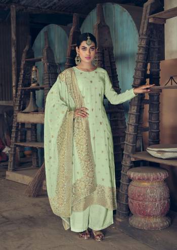 Attrective This Designer Long Length Suit In Lovely Light Color.?Its Pretty Heavy Wevon Jacquard Designer And Hand Work Top Is Silk Based Paired With Cotton Bottom And Silk Jacquard Fabricated Dupatta Which Gives An Attractive To The Suit.