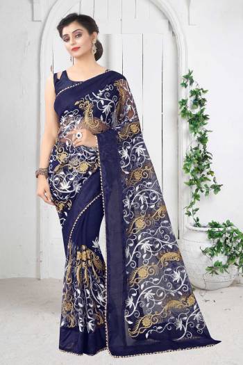 Look Attractive Wearing This Fine Colored Saree Paired With Blouse.  This Heavy Designer Work Saree Is Mono Net Based And Blouse Are Banglori Silk.Which Gives A Rich Look To Your Personality. Buy This Pretty Saree Now.