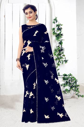 Look Attractive Wearing This Fine Colored Saree Paired With Blouse.  This Heavy Designer Work Saree Is Mono Net Based And Blouse Are Banglori Silk.Which Gives A Rich Look To Your Personality. Buy This Pretty Saree Now.