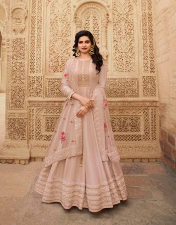 Look Pretty This Designer Anarkali Suit In Lovely Fine Light Color.?Its Pretty Heavy Designer Embroidred Work Top Is Doll Silk Based Paired With Santoon Bottom And Soft Net Fabricated Work Dupatta Which Gives An Attractive To The Suit.