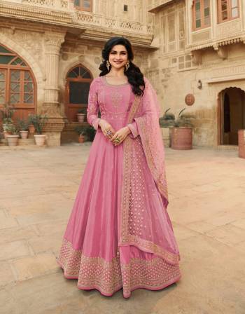 Look Pretty This Designer Anarkali Suit In Lovely Fine Light Color.?Its Pretty Heavy Designer Embroidred Work Top Is Doll Silk Based Paired With Santoon Bottom And Soft Net Fabricated Work Dupatta Which Gives An Attractive To The Suit.