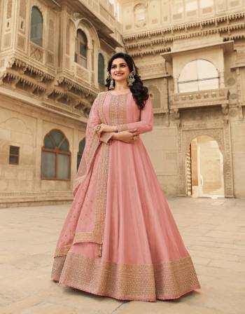 Look Pretty This Designer Anarkali Suit In Lovely Fine Light Color.?Its Pretty Heavy Designer Embroidred Work Top Is Doll Silk Based Paired With Santoon Bottom And Soft Net Fabricated Work Dupatta Which Gives An Attractive To The Suit.