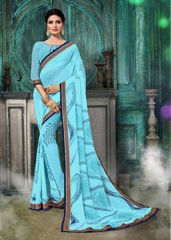 Garb This Designer Saree Are Fine Saree Paired With Blouse.  This Designer Printed Saree Is Georgette Based And Blouse Are Georgette Fabric. Which Gives A Rich Look To Your Personality. Buy This Pretty Saree Now.