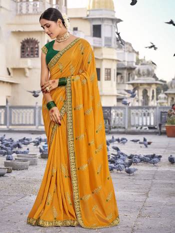 Look Attractive Wearing This Fine Colored Saree Paired With Blouse.  This Heavy Designer Saree Is Vichitra Silk Based Which Gives A Rich Look To Your Personality. Buy This Pretty Saree Now.