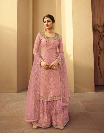 Garb This Designer Long Length Designer Plazzo Suit In Lovely Fine Color.?Its Pretty Heavy Designer Wevon Jacquard And Embroidred Work Top Is Dola Silk Based Paired With Soft Net Bottom And Soft Net Fabricated Dupatta Which Gives An Attractive To The Suit.