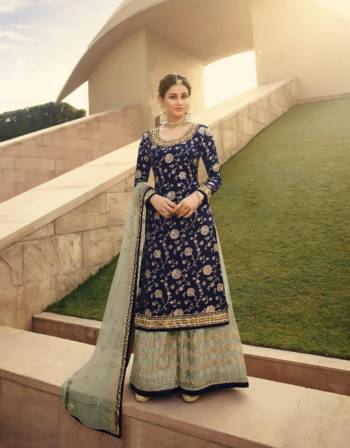 Garb This Designer Long Length Designer Plazzo Suit In Lovely Fine Color.?Its Pretty Heavy Designer Wevon Jacquard And Embroidred Work Top Is Dola Silk Based Paired With Soft Net Bottom And Soft Net Fabricated Dupatta Which Gives An Attractive To The Suit.