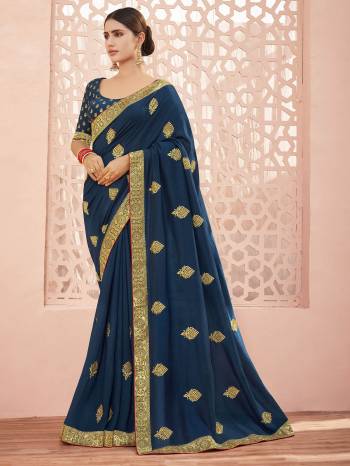 This Party Wear Saree Are Fine Saree Paired With Matching Blouse.This Heavy Embroidery Saree Is Vichitra Silk Based And Blouse Are Art Silk Fabric. Which Gives A Rich Look To Your Personality. Buy This Pretty Saree Now.