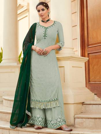 Look Pretty This Designer Long Length Suit In Lovely Fine Light Color.?Its Pretty Heavy Designer Embroidred,Real Mirror,Diamond Work Top Is Faux Georgette Based Paired With Dull Santoon Bottom And Faux Georgette Fabricated Work Dupatta Which Gives An Attractive To The Suit.