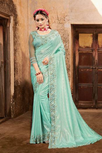 Celebrate And Festive Season And Partywear In This Very Pretty Designer Saree Paired With Blouse. This Saree Are Crepe Silk and Blouse Are Banglori Silk Based Beautified With Detailed Embroidery. 