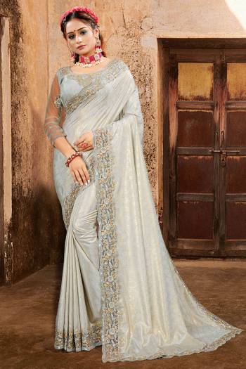 Celebrate And Festive Season And Partywear In This Very Pretty Designer Saree Paired With Blouse. This Saree Are Crepe Silk and Blouse Are Banglori Silk Based Beautified With Detailed Embroidery. 