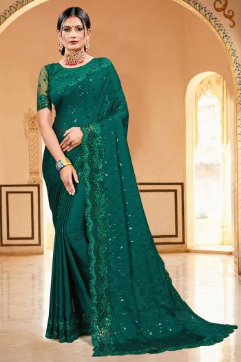 Celebrate And Festive Season And Partywear In This Very Pretty Designer Saree Paired With Blouse. This Saree Are Satin Georgette and Blouse Are Banglori Silk Based Beautified With Detailed Embroidery. 