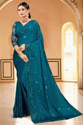 Celebrate And Festive Season And Partywear In This Very Pretty Designer Saree Paired With Blouse. This Saree Are Satin Georgette and Blouse Are Banglori Silk Based Beautified With Detailed Embroidery. 