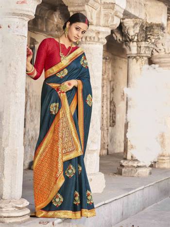 Adorn The Pretty Angelic Look Wearing This Heavy Designer Saree In Fine Color Paired With Contrasting Blouse. This Saree Is Fabricated On Dola Silk Paired With Jacquard Silk Fabricated Blouse. Its Pretty Color Pallete Will Give An Attractive Look To Your Personality. 