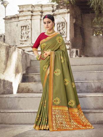 Adorn The Pretty Angelic Look Wearing This Heavy Designer Saree In Fine Color Paired With Contrasting Blouse. This Saree Is Fabricated On Dola Silk Paired With Jacquard Silk Fabricated Blouse. Its Pretty Color Pallete Will Give An Attractive Look To Your Personality. 