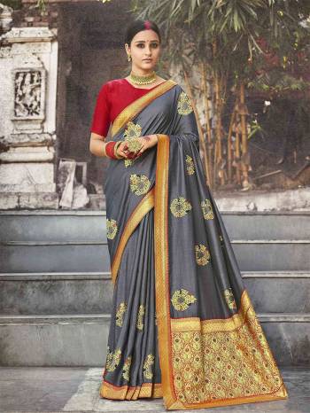 Adorn The Pretty Angelic Look Wearing This Heavy Designer Saree In Fine Color Paired With Contrasting Blouse. This Saree Is Fabricated On Dola Silk Paired With Jacquard Silk Fabricated Blouse. Its Pretty Color Pallete Will Give An Attractive Look To Your Personality. 