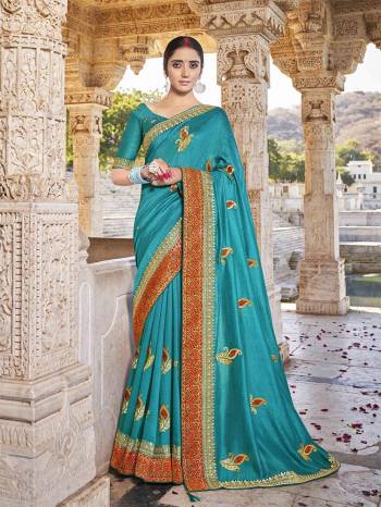 Look Attractive Wearing This Fine Colored Saree Paired With Blouse.  This Heavy Designer Embroidery Work Saree Is Vichitra Silk Based Which Gives A Rich Look To Your Personality. Buy This Pretty Saree Now.