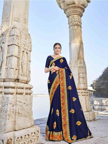 Look Attractive Wearing This Fine Colored Saree Paired With Blouse.  This Heavy Designer Embroidery Work Saree Is Vichitra Silk Based Which Gives A Rich Look To Your Personality. Buy This Pretty Saree Now.