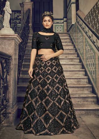 Attrective Bridal Partywear Heavy Designer Lehenga Choli And Dupatta In Black Color Fabricated On Net Beautified With Heavy Attractive Seaqoance Embroidery Work. 